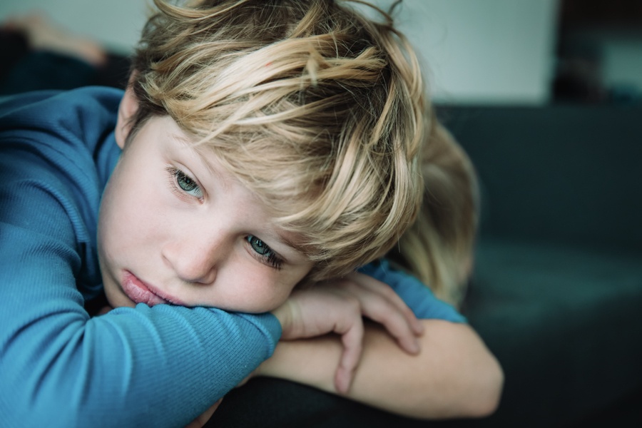 A boy experiencing childhood trauma