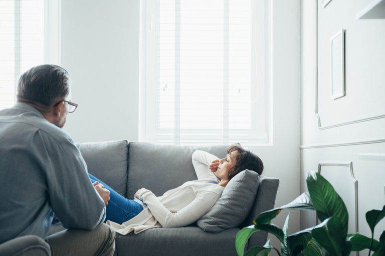 woman in therapy session discussing how long trauma can last