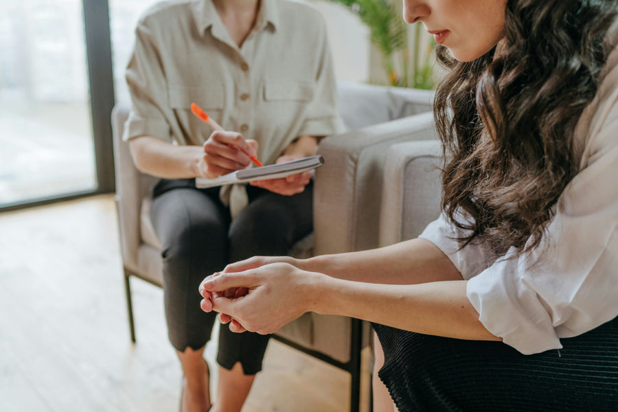 woman in therapy session for CPTSD treatment