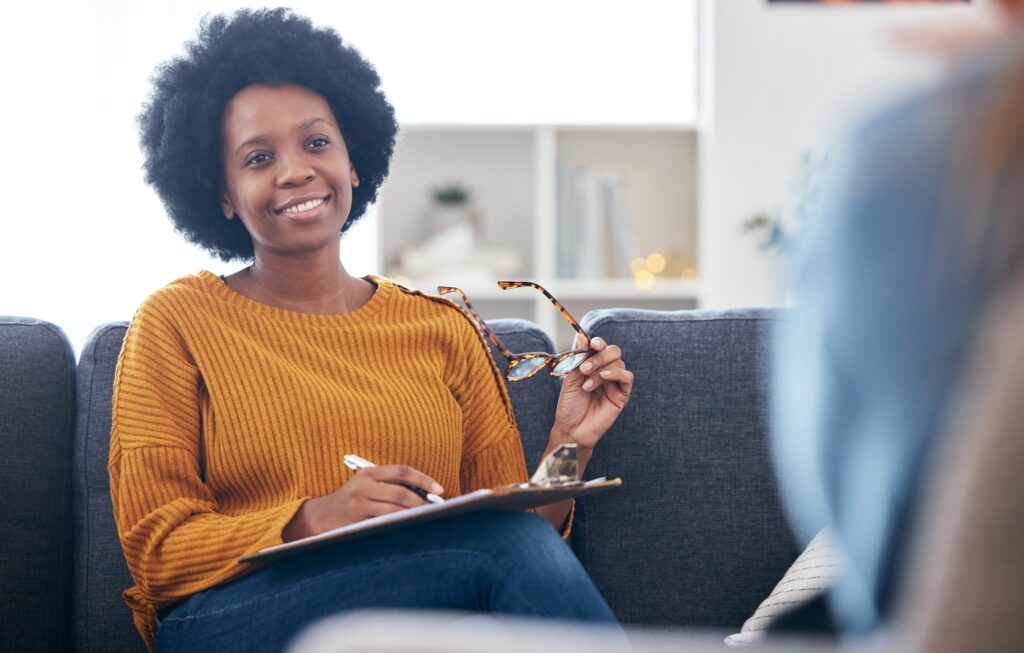 Therapist discussing coping mechanisms and mindfulness techniques