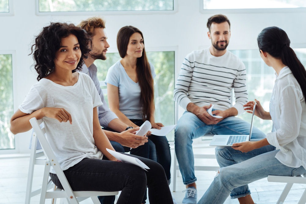 a group of people attending therapy to heal from trauma bonding