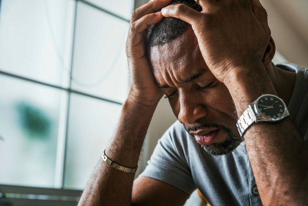 man suffering from addiction and mental illness