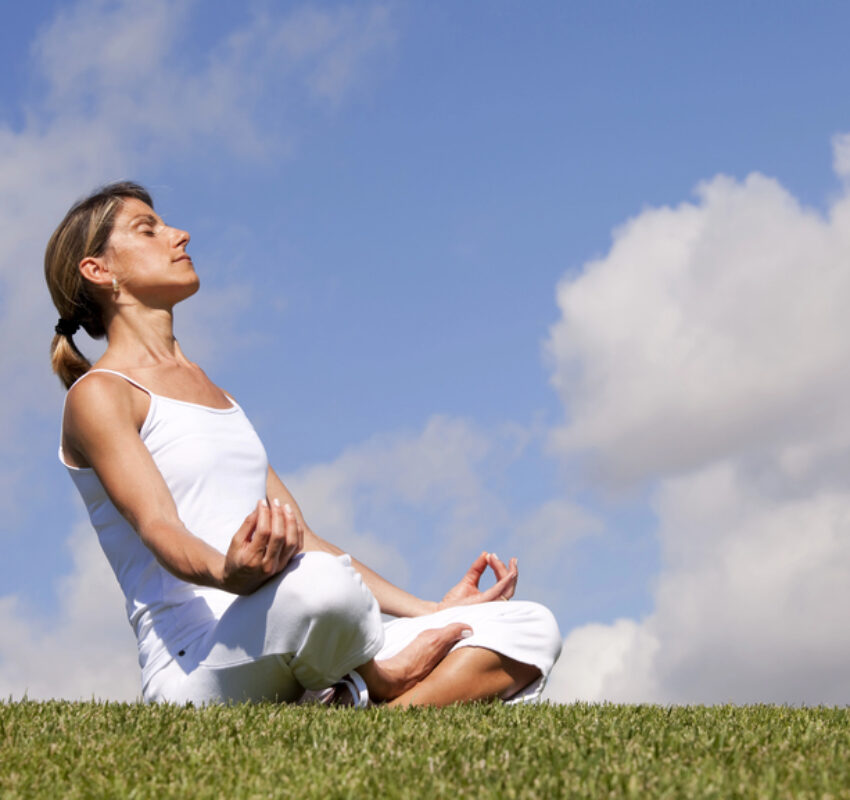 woman doing breathework woman doing breathework