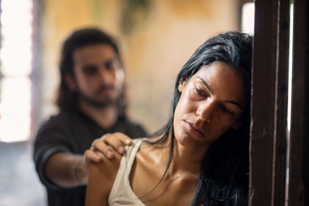 Person struggling and reflecting on how common is CPTSD