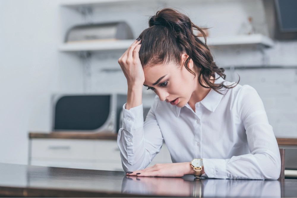 picture of a sad young woman showing signs of trauma