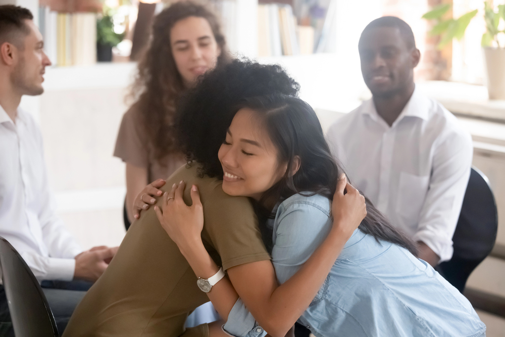 Happy woman celebrates overcoming trauma from cheating