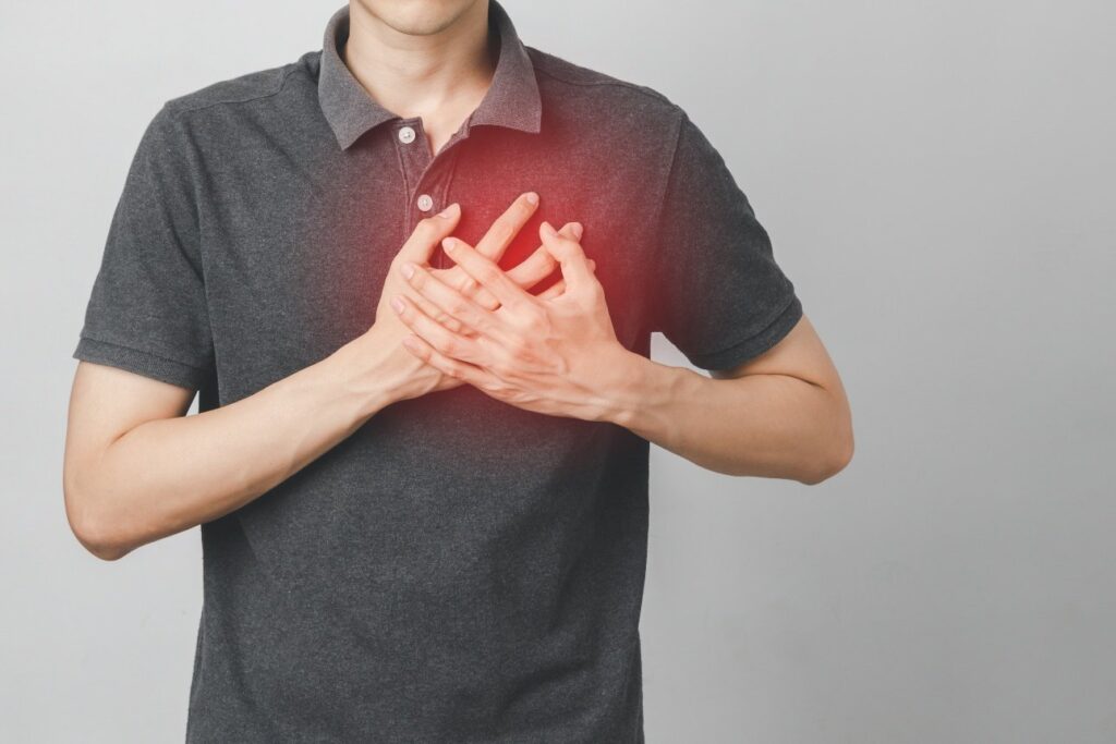 Man has chest pain suffering by heart disease, Cardiovascular disease, heart attack.