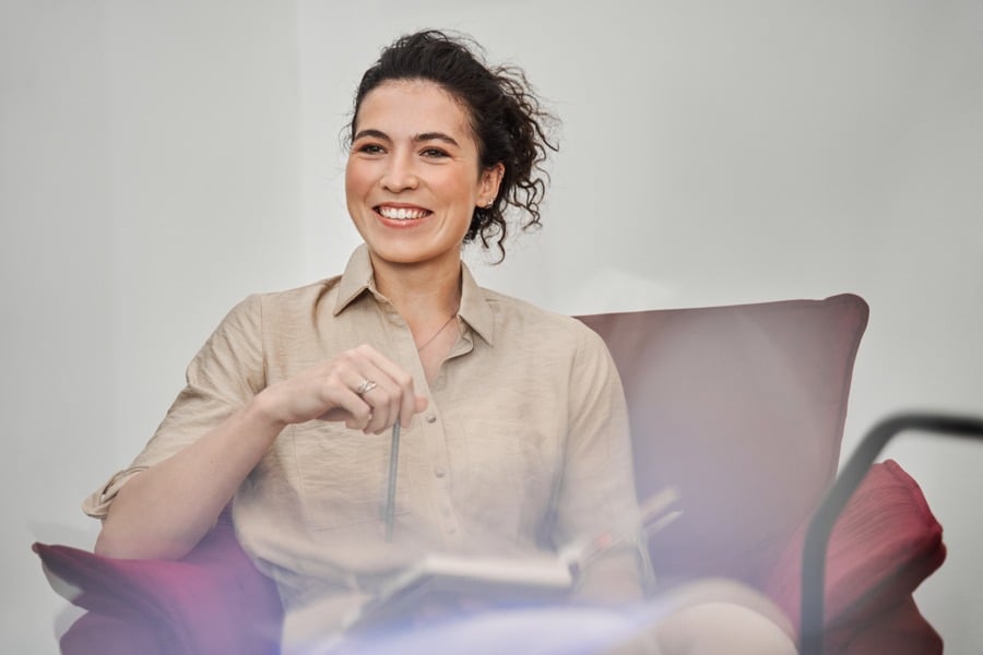 a therapist smiling during therapy