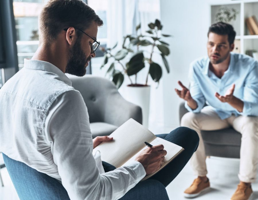 patient discussing insurance options