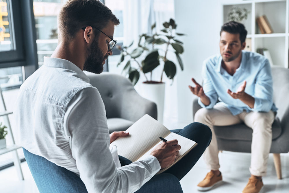 patient discussing insurance options
