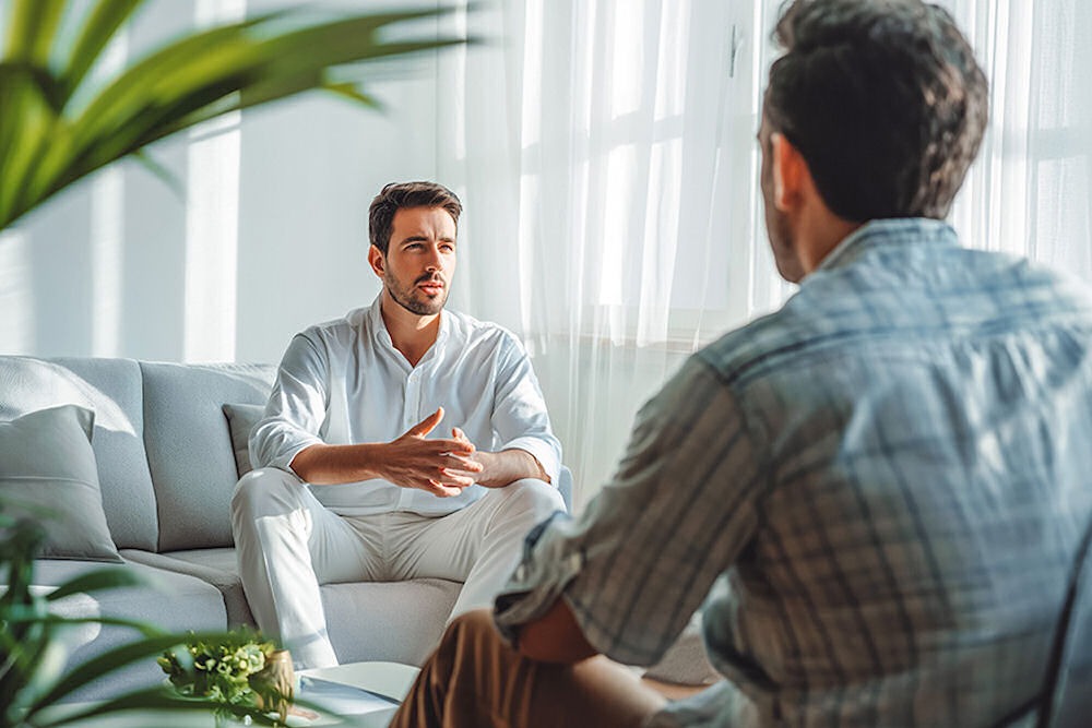 Man receiving therapy at luxury rehab center in New York