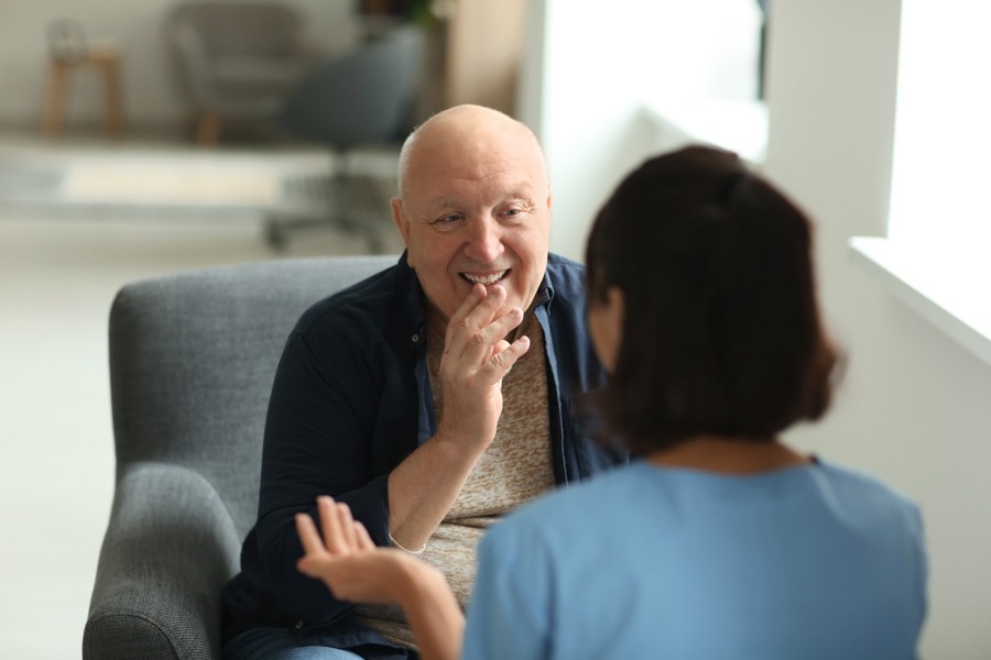 Therapist guiding a patient through Deep Brain Reorienting Therapy for emotional healing